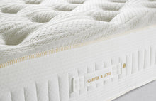 Cashmere mattress border with gold piping and branded Carter & Lewis handle, handmade in Yorkshire