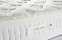 Diamond mattress border with gold rope piping, channel stitching and gold Carter & Lewis handle label