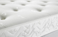 Forrest mattress border with leaf and scroll jacquard on its dual-sided tufted edge