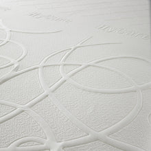 Close-up of the looping jacquard knitted cover on the HyCare Comfort mattress