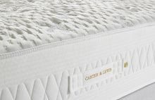 Lay-Cell mattress edge with wave-quilted border and branded Carter & Lewis handle