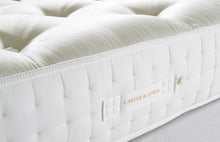 Sleep Adaptive mattress border with channel stitching and branded handle, hand-tufted in Yorkshire