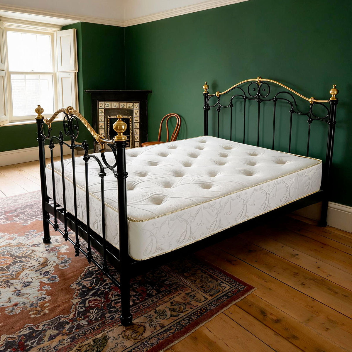 Carter & Lewis HyCare Ortho hand-tufted mattress on a black iron and brass bedstead in a Victorian bedroom