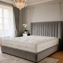 Carter & Lewis Lay-Cell luxury natural mattress on a grey channel-tufted velvet bed in an elegant London bedroom